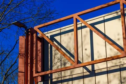 Metal Frame, Building, Tree, and Sky Stock Photos