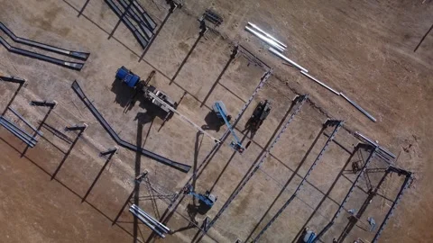 Metal frame construction site pull out  machinery close up  top down crane 動画素材 333799210