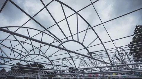 Metal frame with dark cloud background. Foto stock