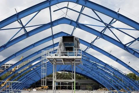 Metal frame structure on constraction site of the shopping mall building Stock Photos