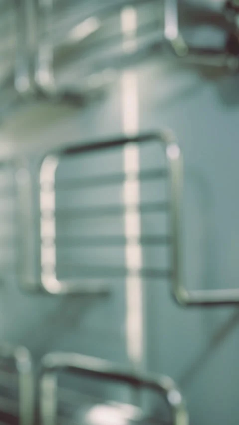 Metal frames on a wall in a store during daytime with soft lighting Video stock 336172599
