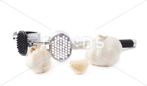 Metal garlic masher isolated over the white background Stock Photos