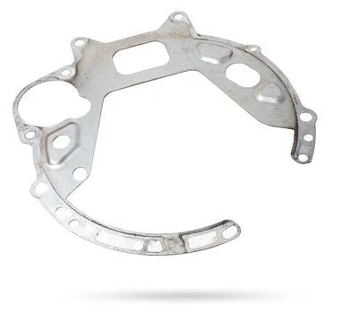 A metal gasket between the engine and a metal gearbox to seal the joint in .. Stock Illustration