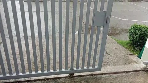 The metal gates open Stock Footage 324633063