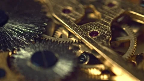 Metal gold cogwheels inside clockwork Stock Footage 139689938