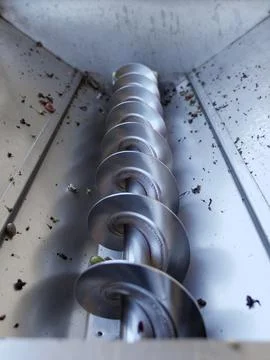 Metal grape stalk separator machine during the harvest Stock Photos