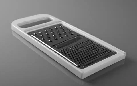 Metal grater with plastic handle Stock-Fotos