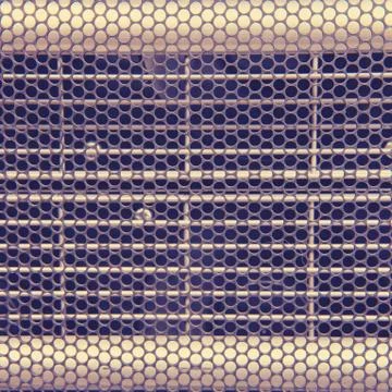 Metal grid background with round server holes, gray texture of computer prote Foto stock