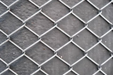 Metal grid pattern and texture background, industrial metallic surface Photos