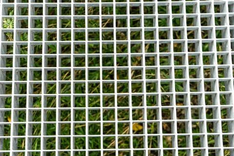 Metal grid structure close up Stock Photos