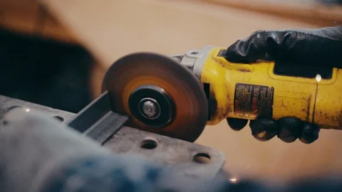 Metal grinder creates explosion of sparks slow motion bokeh Видео 104076367