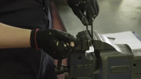 Metal handle in vice grip Stock Footage 151357521