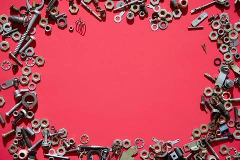 Metal hardware frame on red background Stock Photos