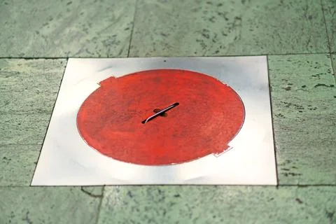 Metal hatch of a fire hydrant in the stone floor of the subway Stock Photos