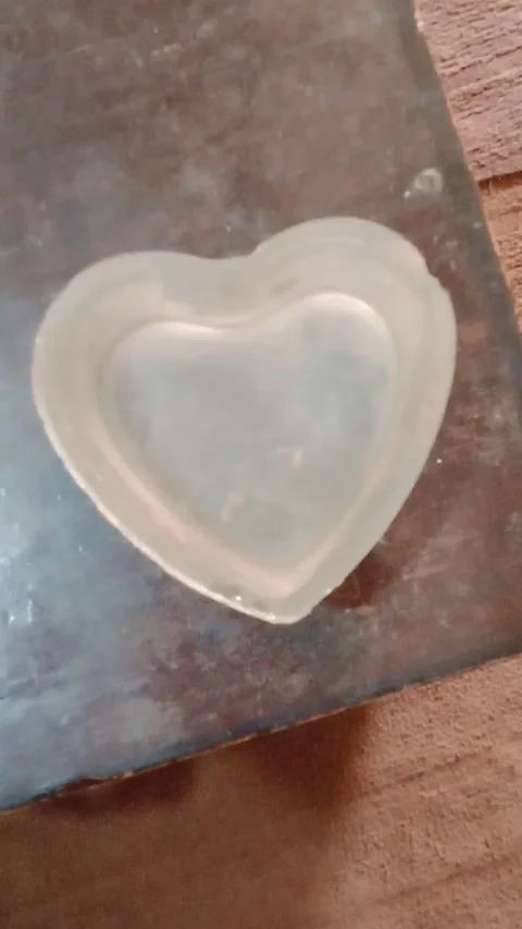 Metal heart shape object Stock Footage 321926615