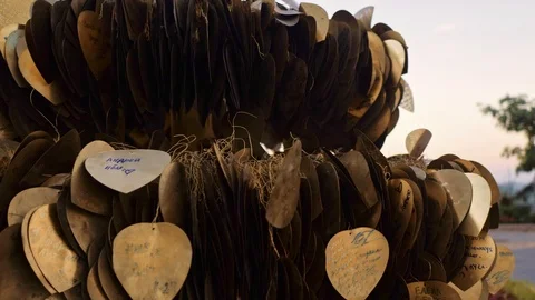 Metal hearts on artificial tree from couples expressing their eternal devotion 스톡 동영상 106360852