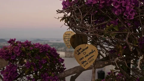 Metal hearts on artificial tree from couples expressing their eternal devotion Video stock 106361084