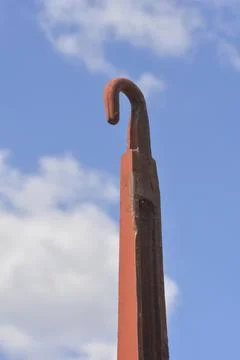 Metal hook part of a train wagon against the sky Stock Photos