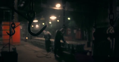 Metal hooks on the engine production line. Metallurgical industry. Car engine Stock Footage 123897152