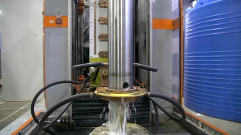 Metal induction hardening machine. Process of quenching metal with a high Stock Footage 128976882