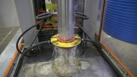 Metal induction hardening machine. Process of quenching metal with a high Stock Footage 128977353