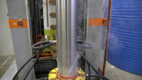 Metal induction hardening machine. Process of quenching metal with a high Stock Footage 128977760