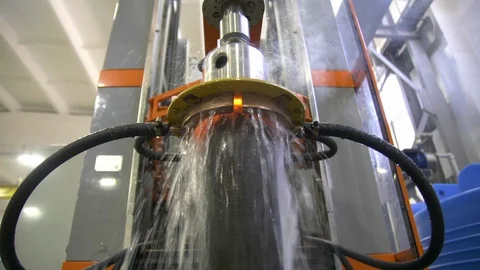 Metal induction hardening machine. Process of quenching metal with a high Stock Footage 128979032