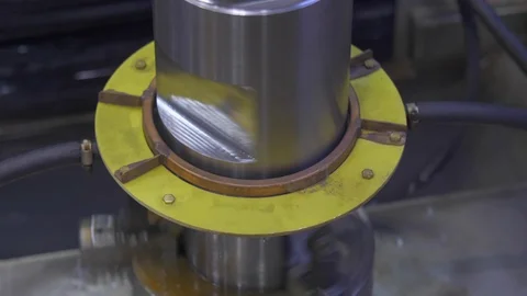 Metal induction hardening machine. Process of quenching metal with a high Stock Footage 128980272