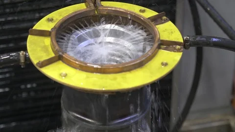 Metal induction hardening machine. Process of quenching metal with a high Stock Footage 128981778