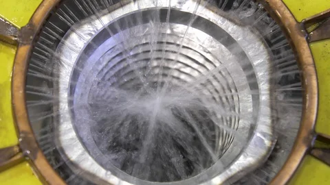 Metal induction hardening machine. Process of quenching metal with a high Stock Footage 128982115