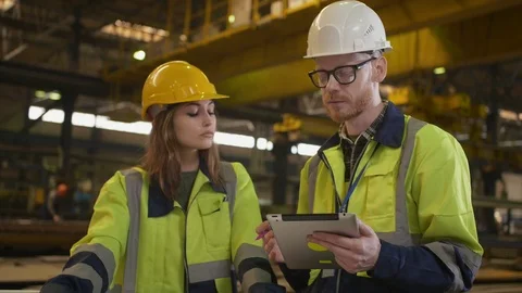 Metal industry manager and engineer meeting in factory Stock Footage 106566238