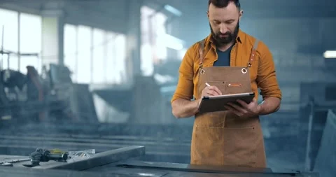 Metal industry worker with a digital tablet at the plant 스톡 동영상 147284992