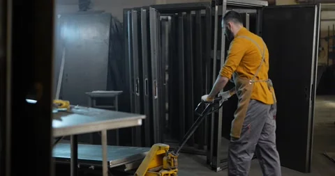 Metal industry worker working at the warehousel Stock Footage 147293699