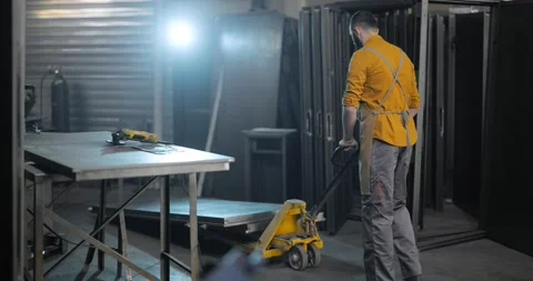 Metal industry worker working at the warehousel Stock Footage 147293816