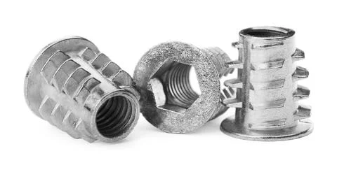 Metal insert nuts isolated on white. Hardware tool Foto stock