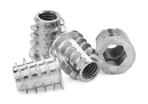 Metal insert nuts isolated on white. Hardware tool 写真素材