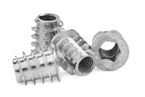 Metal insert nuts isolated on white. Hardware tool 写真素材