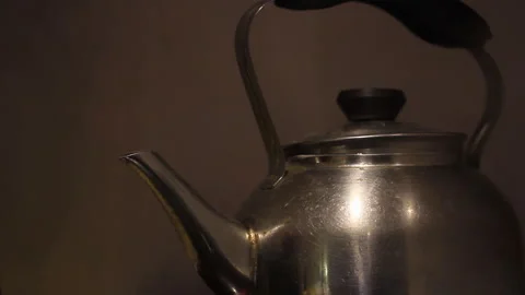Metal Kettle Boiling Water in Kitchen Vídeo Stock 343023592