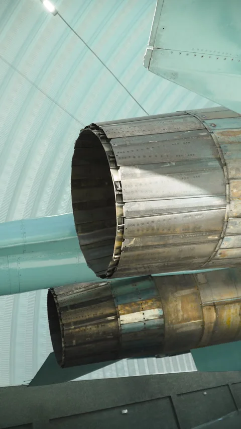 Metal large engine nozzles on body of fighter jet, vertical video. Stock Footage 343953887