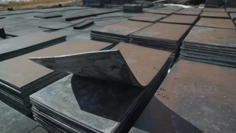 Metal lead rectangular plates arranged in a row with a bent corner video Stock Footage 124152799