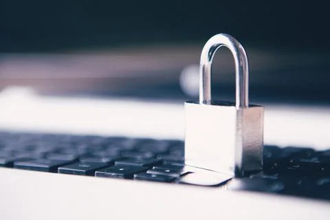 Metal lock on the keyboard Stock Photos