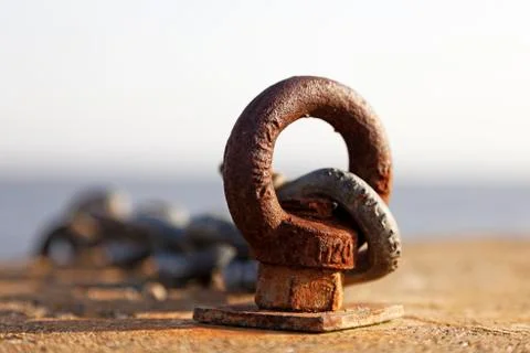 Metal loop with chain in which you can moor boats Stock Photos