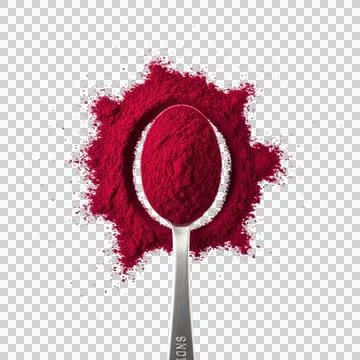 Metal measuring spoon filled with deep red beet powder over a textured circ.. 스톡 사진