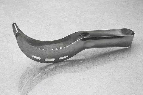 Metal-melon-scooping-tool   Stock Photos