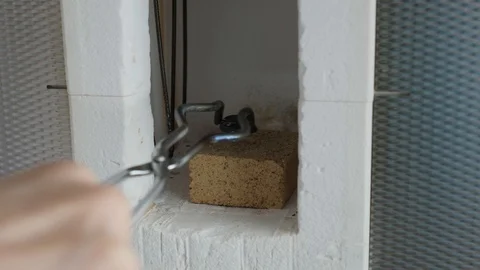 Metal melting in the cube Stock Footage 122062955