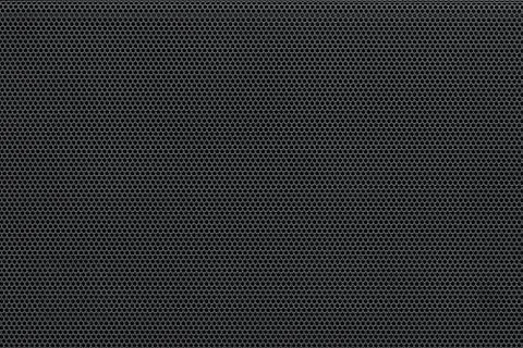 Metal mesh background pattern. Closeup of audio speaker protection perforated 写真素材