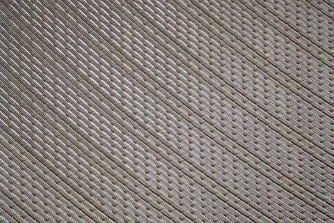 Metal mesh texture, abstract pattern, woven wire, industrial surface, stainle Stock Photos