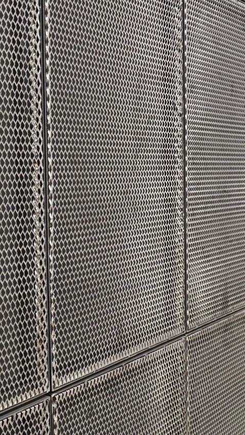 Metal mesh wall panels creating modern architectural design Stock-Footage 315359335