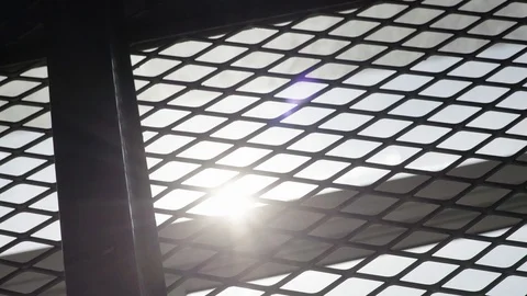 The Metal Mesh Window Appear Sun Fare Light in Sky Stock Footage 128679822