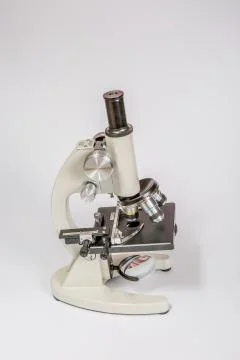 Metal microscope on white background Stock Photos